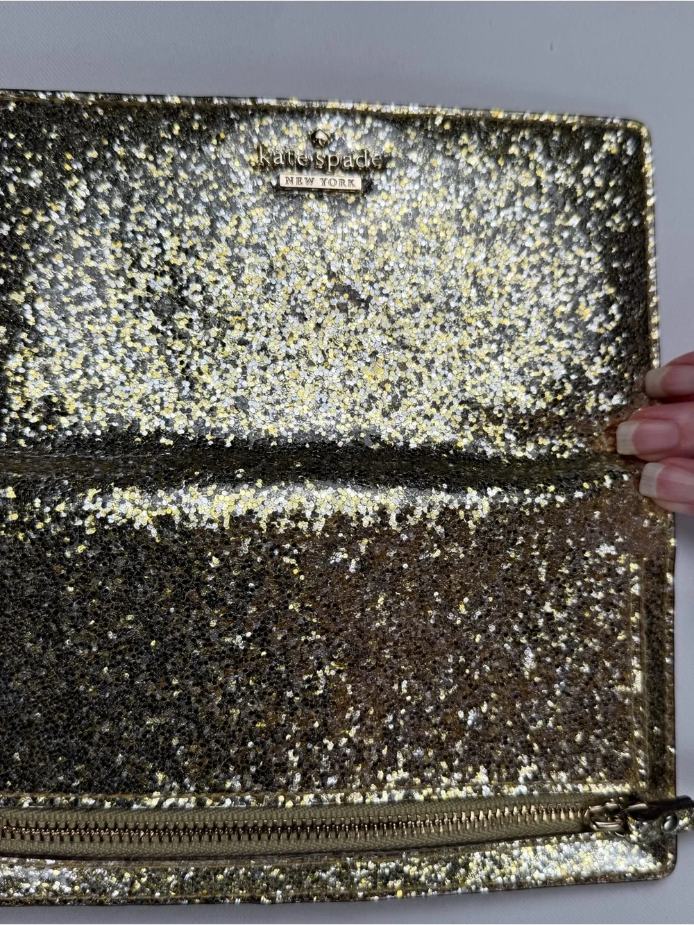 kate spade Gold Glitter Folio wallet with magnetic closure - fun and flirty